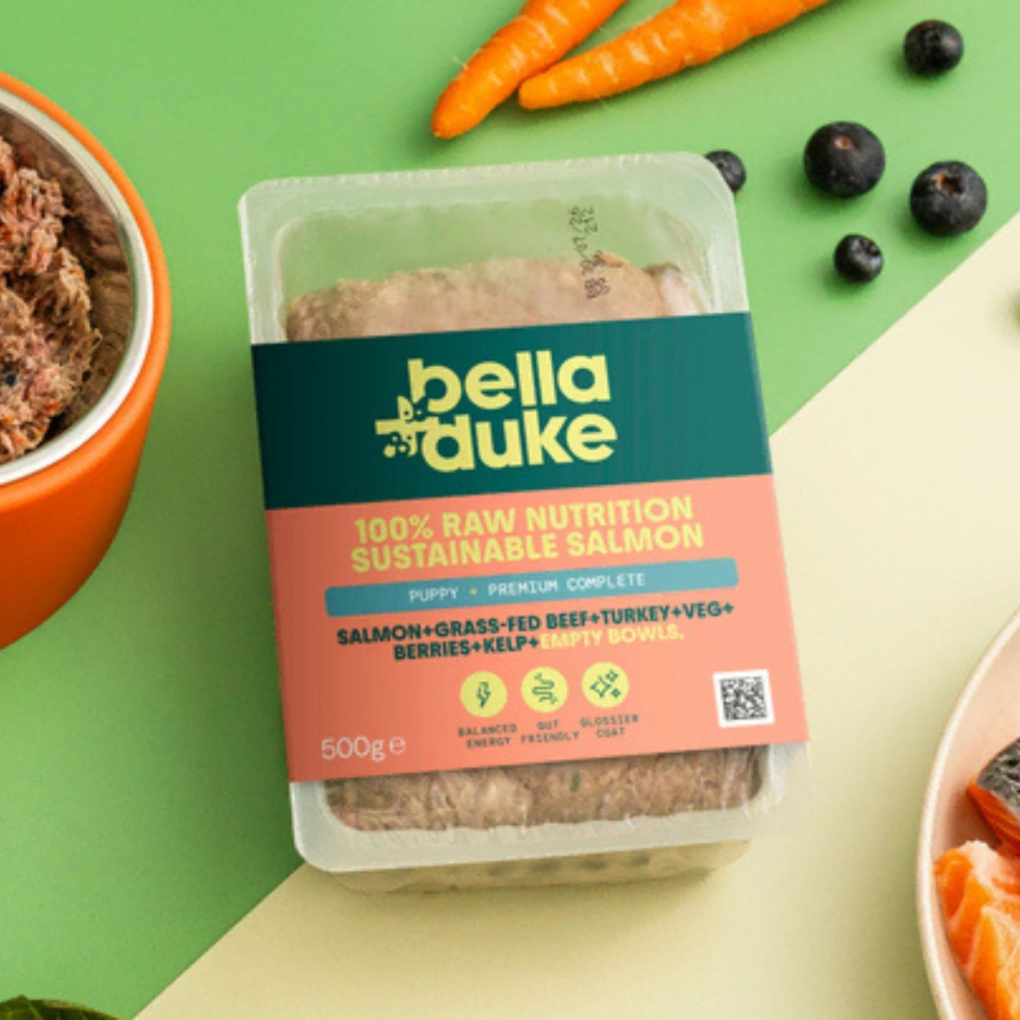 Packaged food product with bella+duke branding on a green and beige background with ingredients.