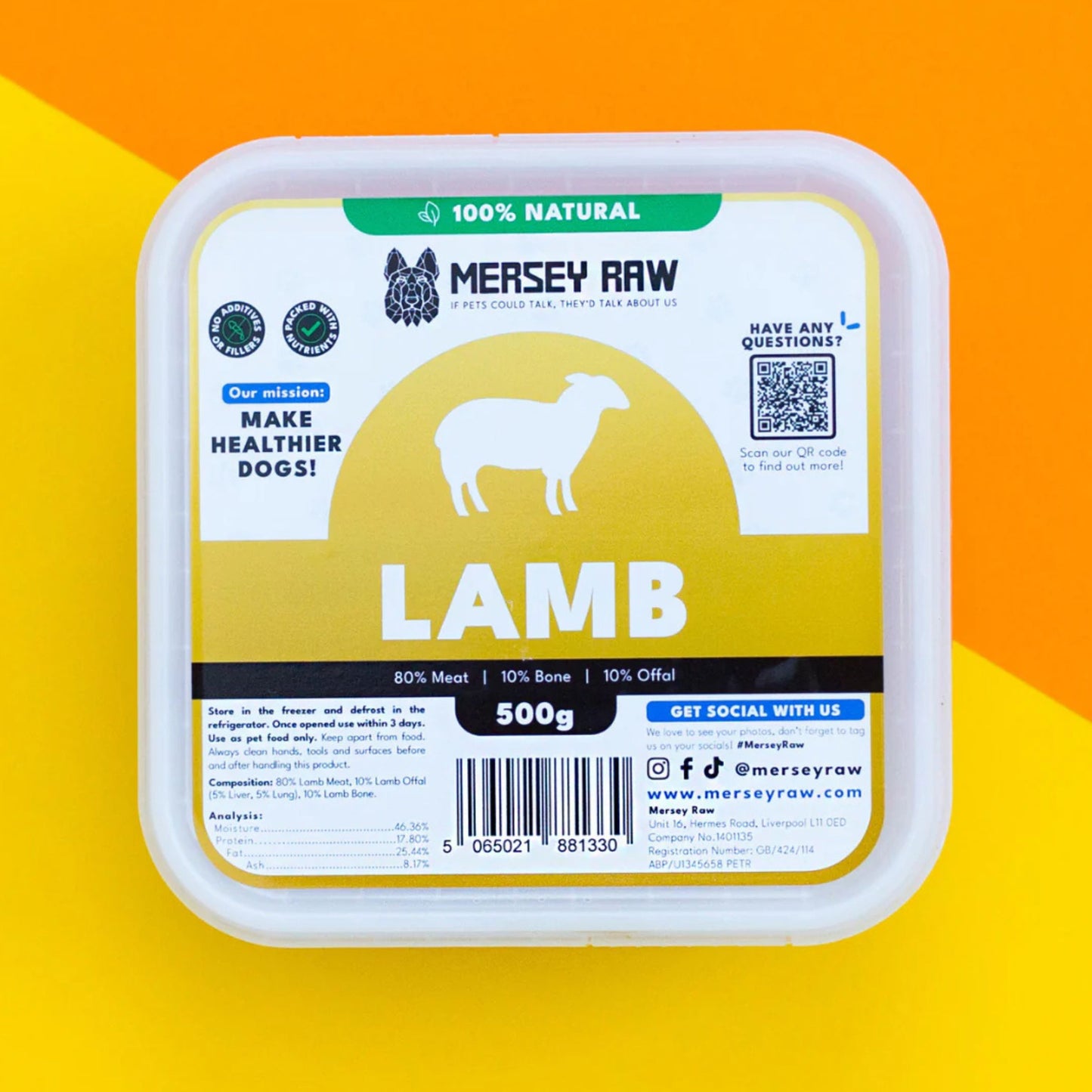 Mersey Raw Lamb dog food in a 500g white plastic tub with a colorful label, set against a bright yellow and orange background.