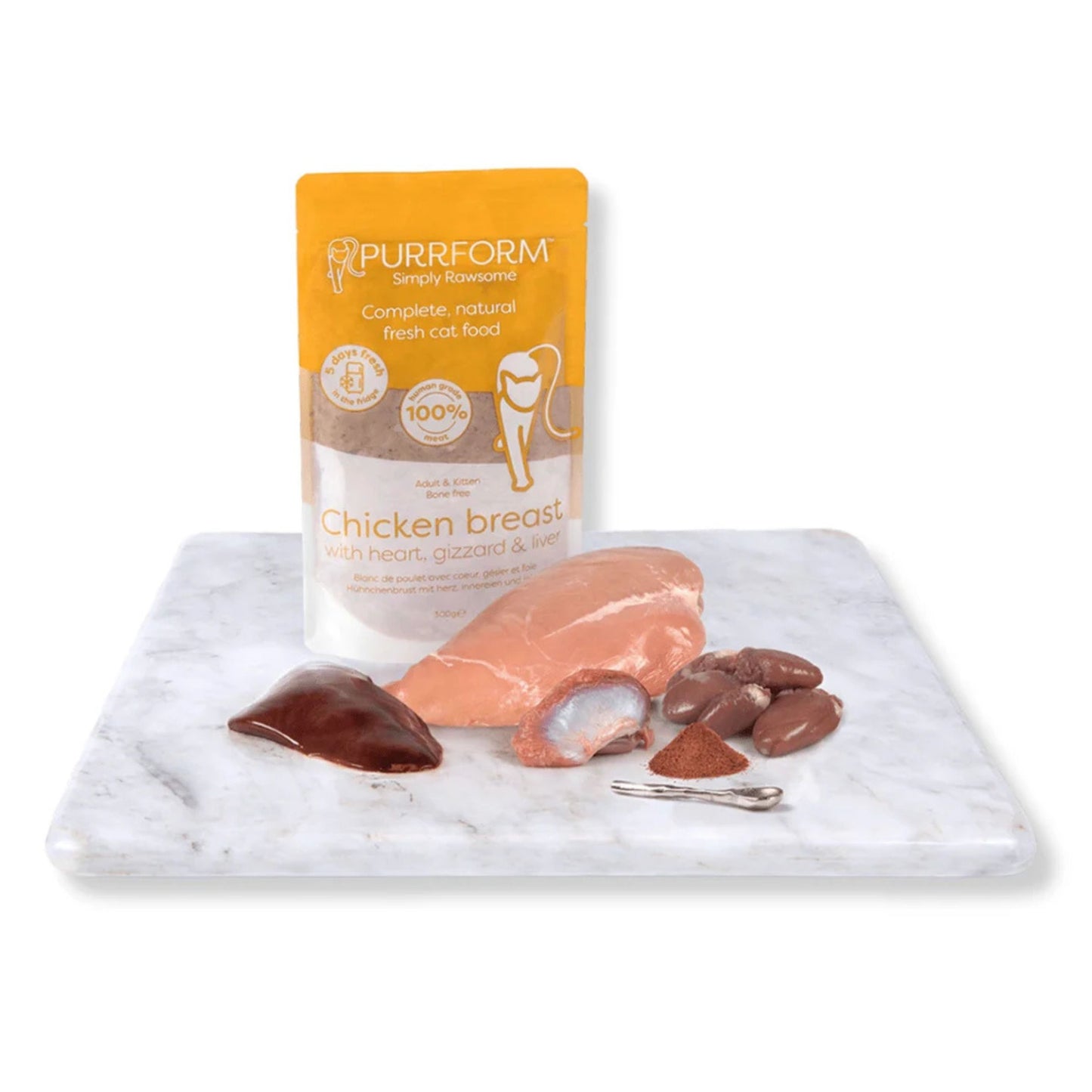 Purrform chicken breast package on a marble slab with chicken pieces and heart-shaped treats.