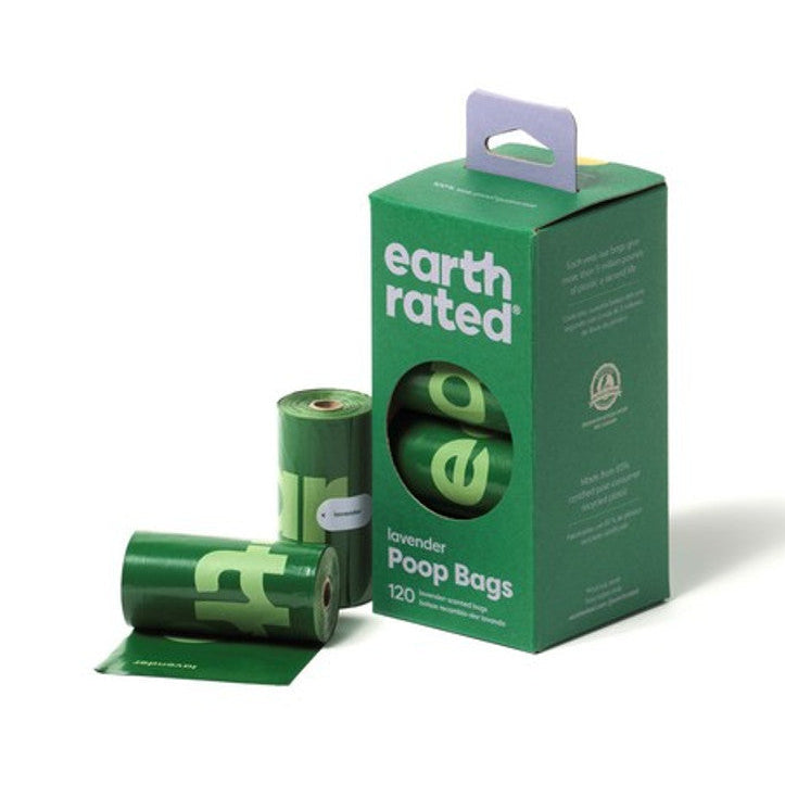 A box labeled 'Earth Rated' next to a roll of poop bags with some bags spilling out. The packaging indicates the product is for 120 bags in total, with 8 rolls of 15 bags each.