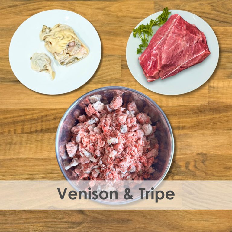 Three plates with venison, tripe, and ground meat on a wooden surface.