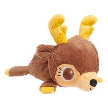 A brown plush dog toy shaped like a deer or cartoon animal, lying on its side with yellow textured antlers, a cream-colored snout and feet, and a black nose, photographed on a plain white background.