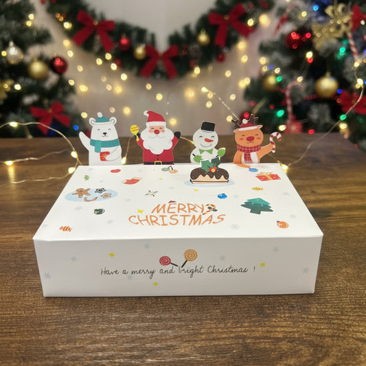 Christmas-themed box with cartoon characters on a wooden surface, next to a Durham Foods box.