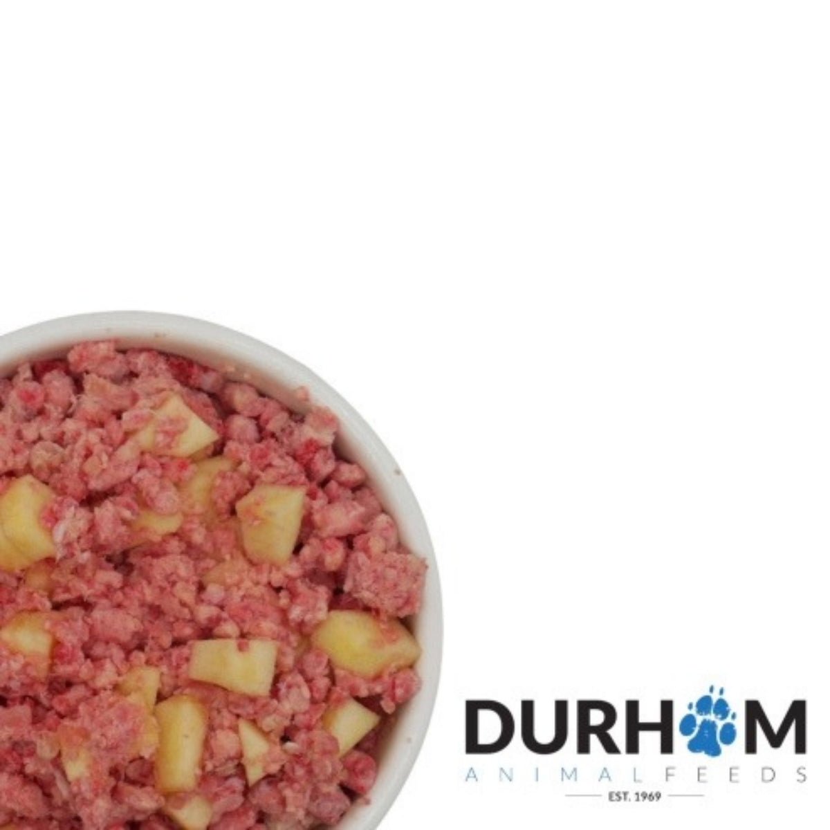 A close-up of a white bowl filled with raw, minced pink animal food mixed with pale yellow chunks, shown on a white background with the DURHAM ANIMALFEEDS logo in the bottom right corner.