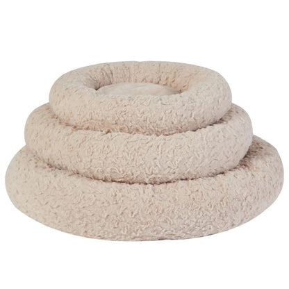 A three-tiered fluffy pet bed in a light beige sherpa fabric, photographed against a solid white background.
