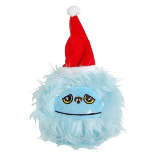 A light blue fluffy plush monster shaped like a ball with a sad face and a red Santa hat, shown on a plain white background.