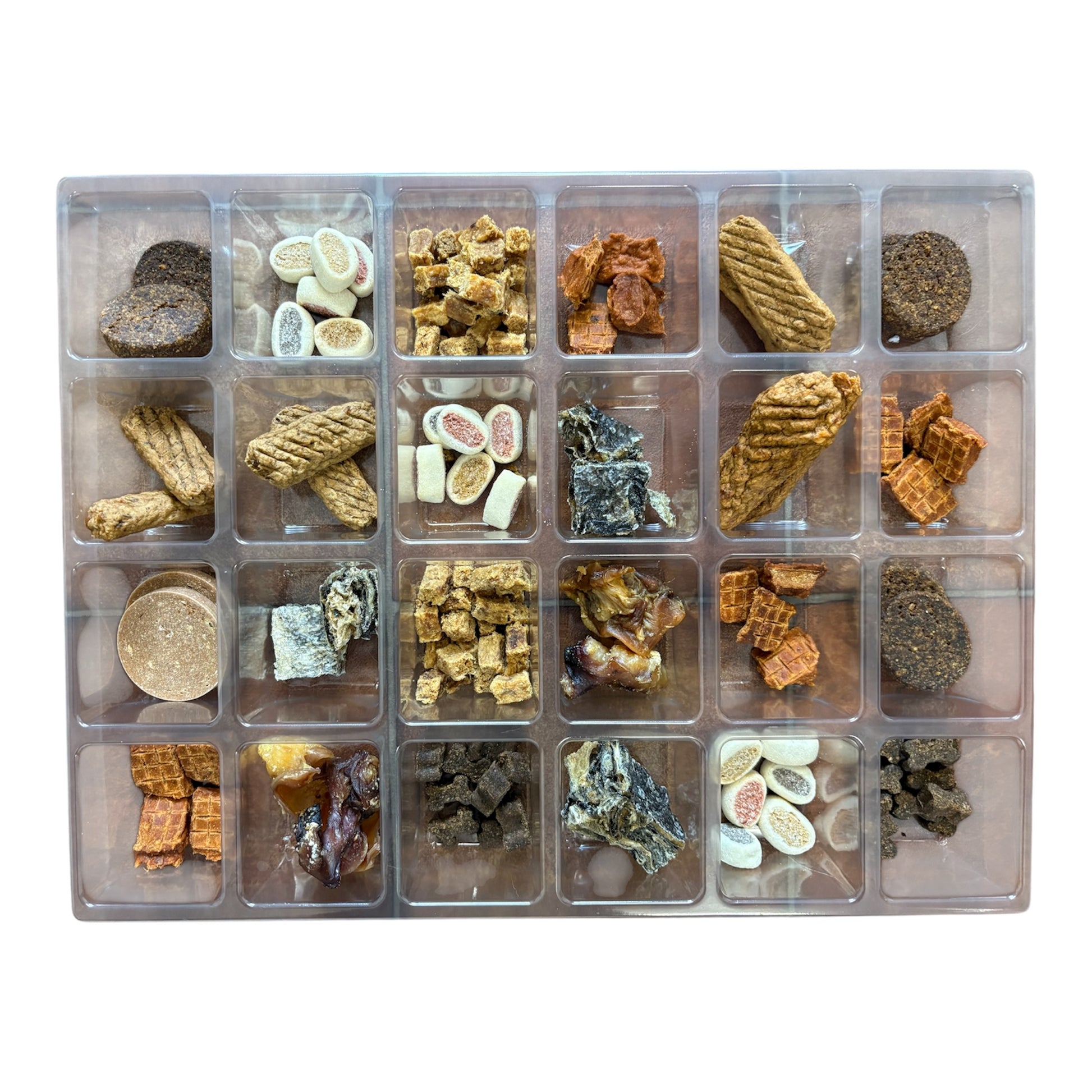 Clear organizer with various small food items arranged in compartments on a white background