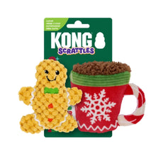 Kong Scrattles cat toy set featuring a yellow gingerbread man plush toy and a red holiday mug plush toy with a brown crumb top, displayed in front of its green branded retail card on a white background.