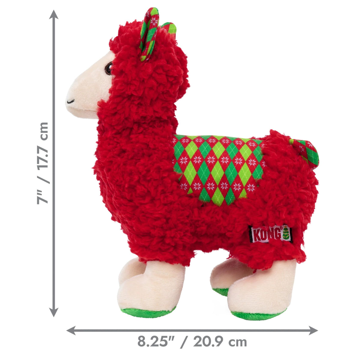 A red plush llama dog toy with cream-colored hooves and face, wearing a green and red argyle sweater, shown on a white background with dimension arrows indicating 7 inches in height and 8.25 inches in width.