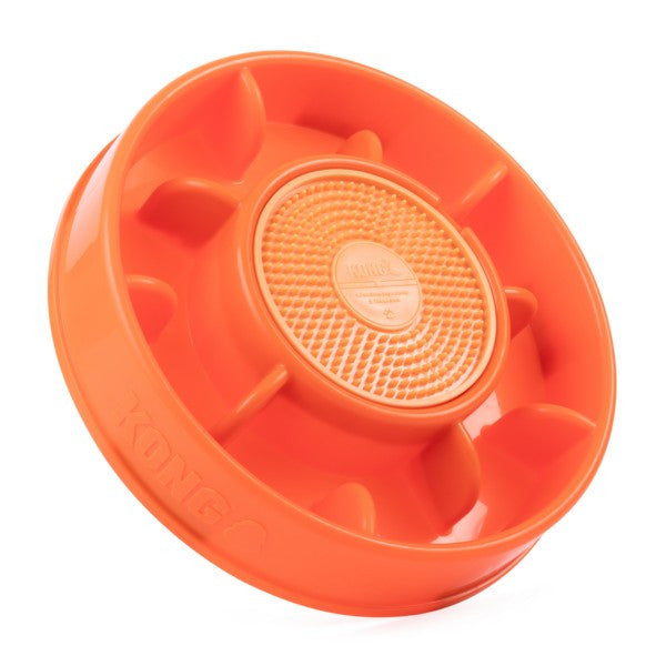Orange plastic wheel with textured center on a white background