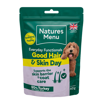 Natures Menu dog food package for good hair and skin day on a black background