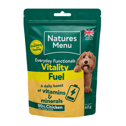 Natures Menu dog food packet on a black background