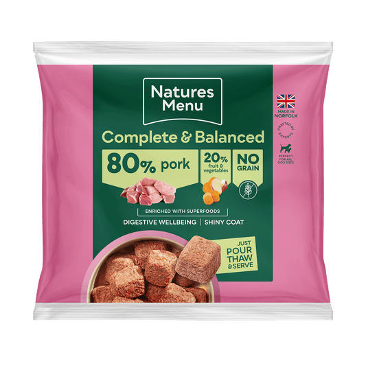 Natures Menu pet food package with pink and green design on a white background