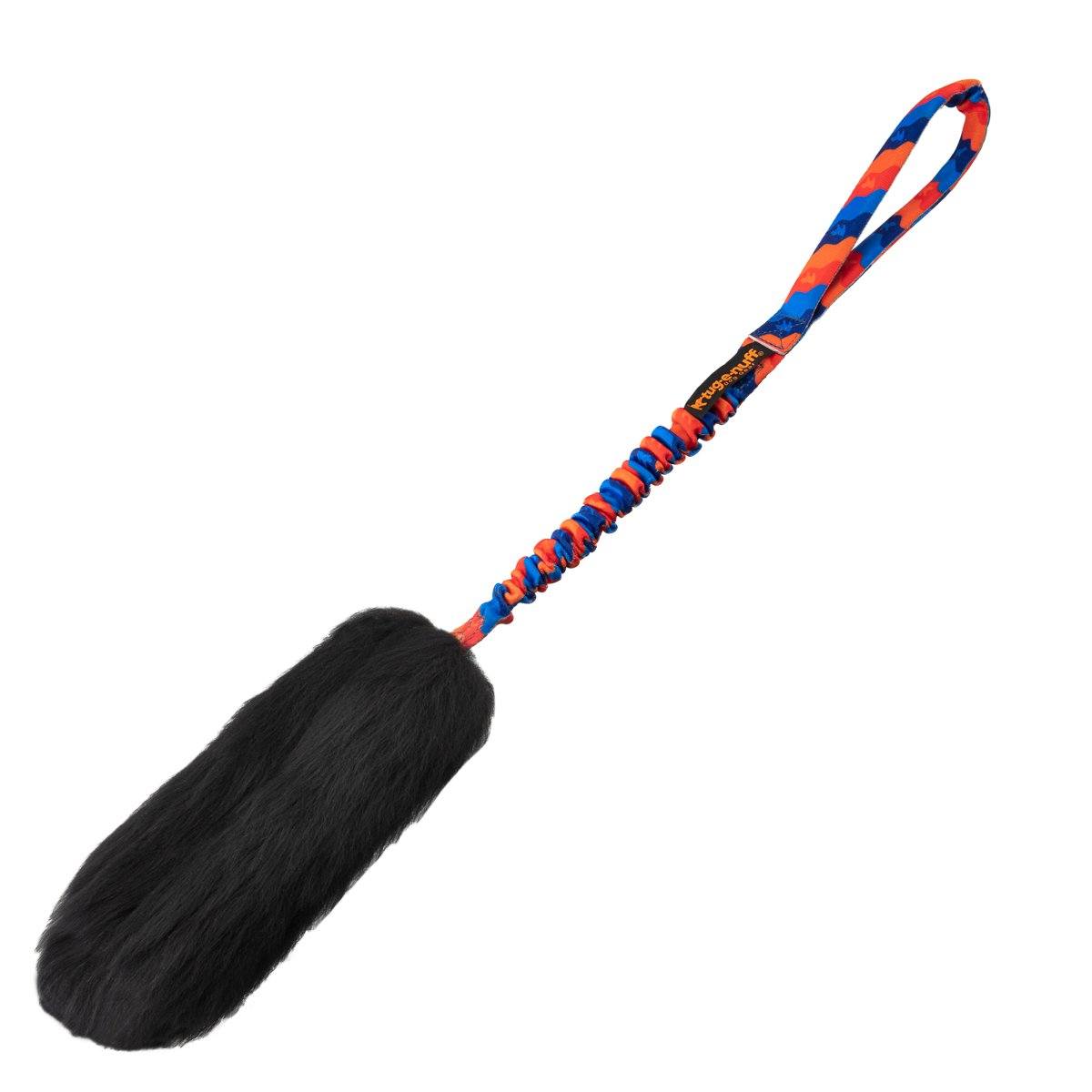 Dog toy with black sheepskin fur end and colourful braided handle on a white background