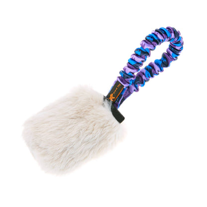 Dog toy with purple handle and white fur on a white background