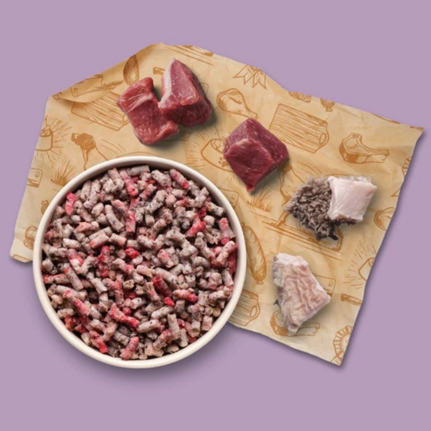 Frozen pet food with raw meat pieces on a branded packaging against a purple background