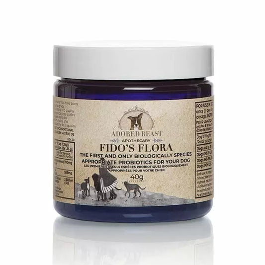 Adored Beast Fido's Flora probiotics for dogs in a blue tub with white lid on a white background