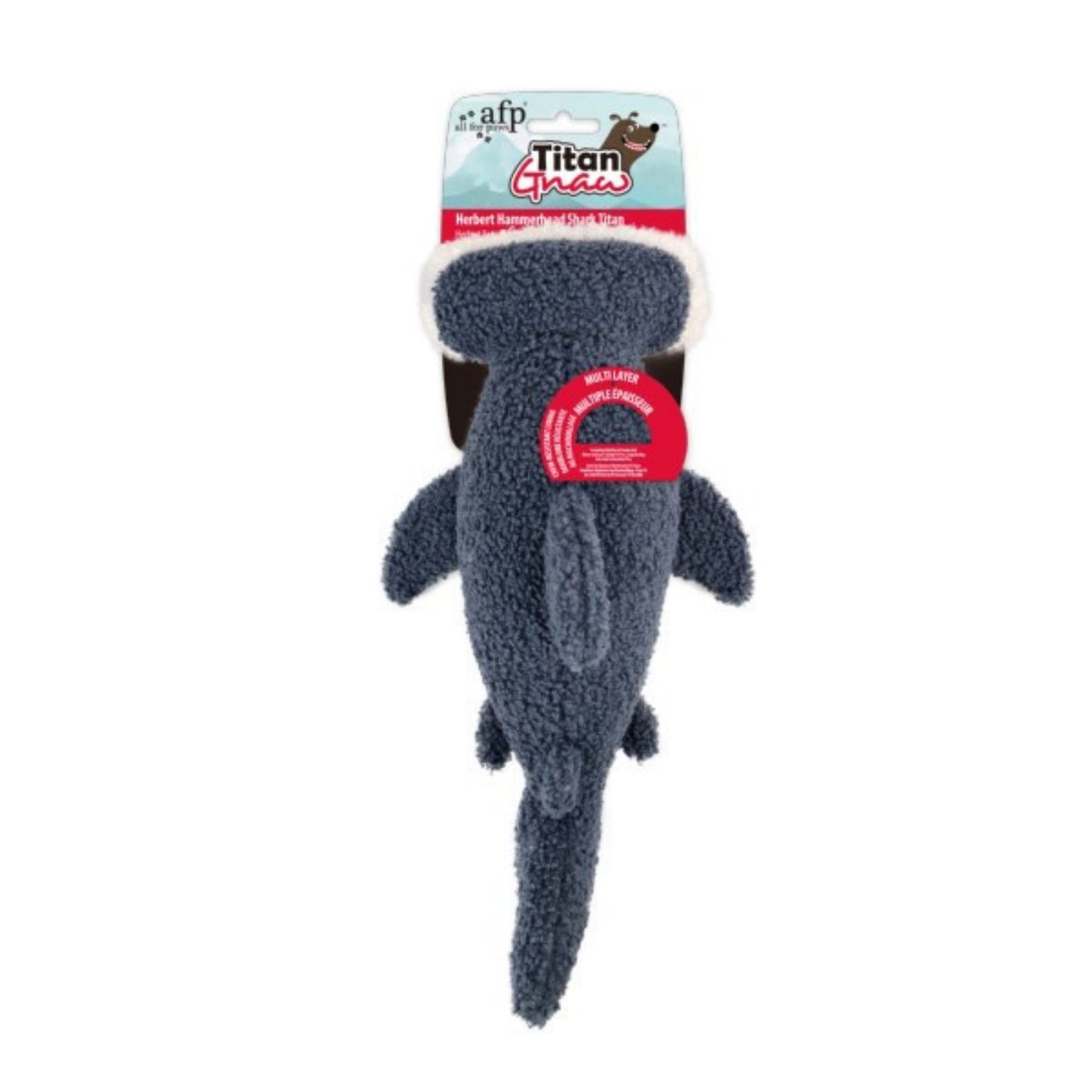 Dog toy shaped like a shark with packaging on a white background