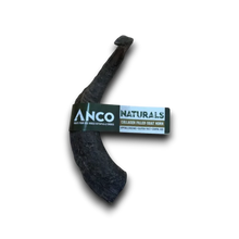 Dog chew goat horn with 'Anco Naturals' label on a white background