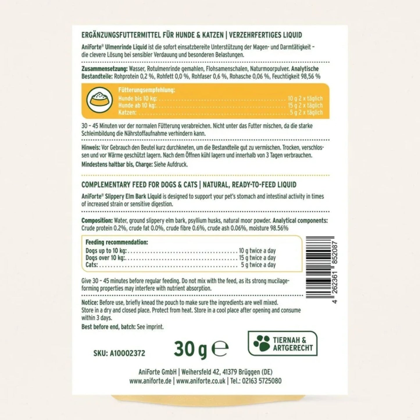 The back of a white package of complementary feed for dogs and cats, showing German text, ingredients, feeding recommendations, and a barcode.