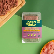Packaged food product with bella+duke label on a green background