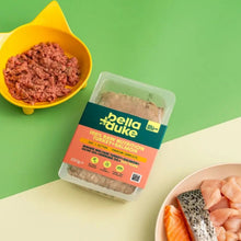 Packaged food with bella+duke branding on a green and beige background