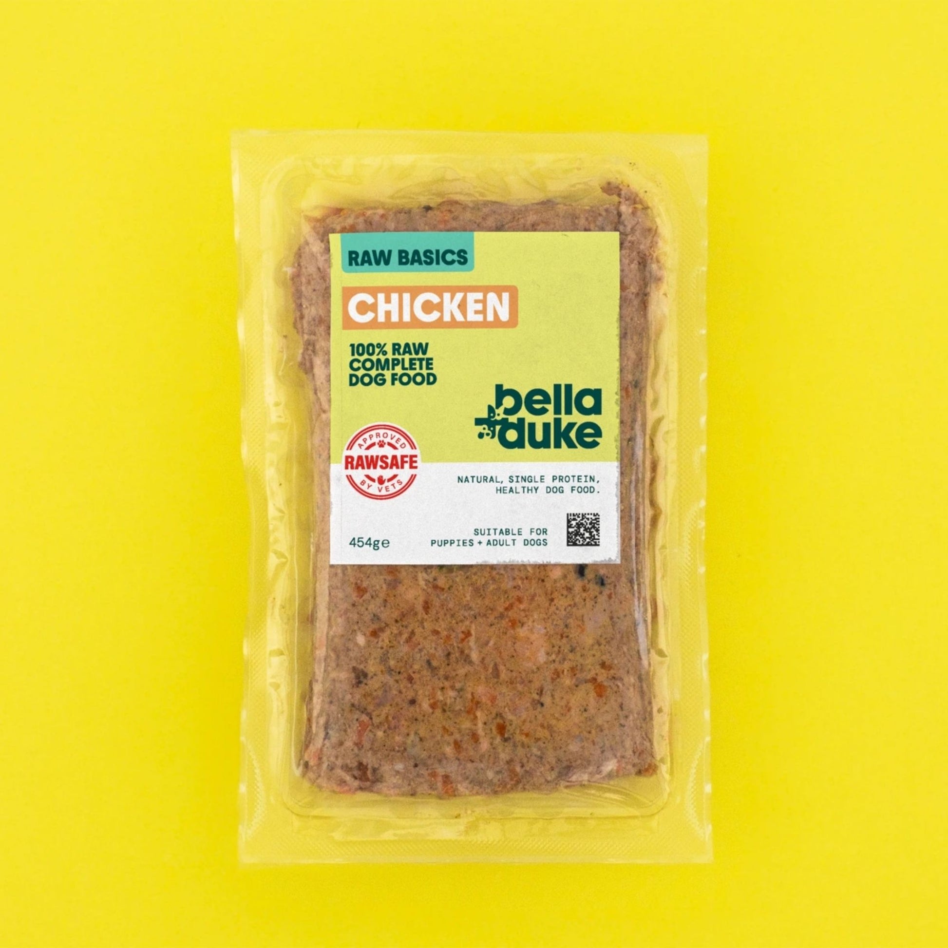 Packaged beef raw dog food from Bella & Duke on a yellow background