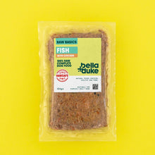 Packaged raw dog food with bella+duke branding on a yellow background