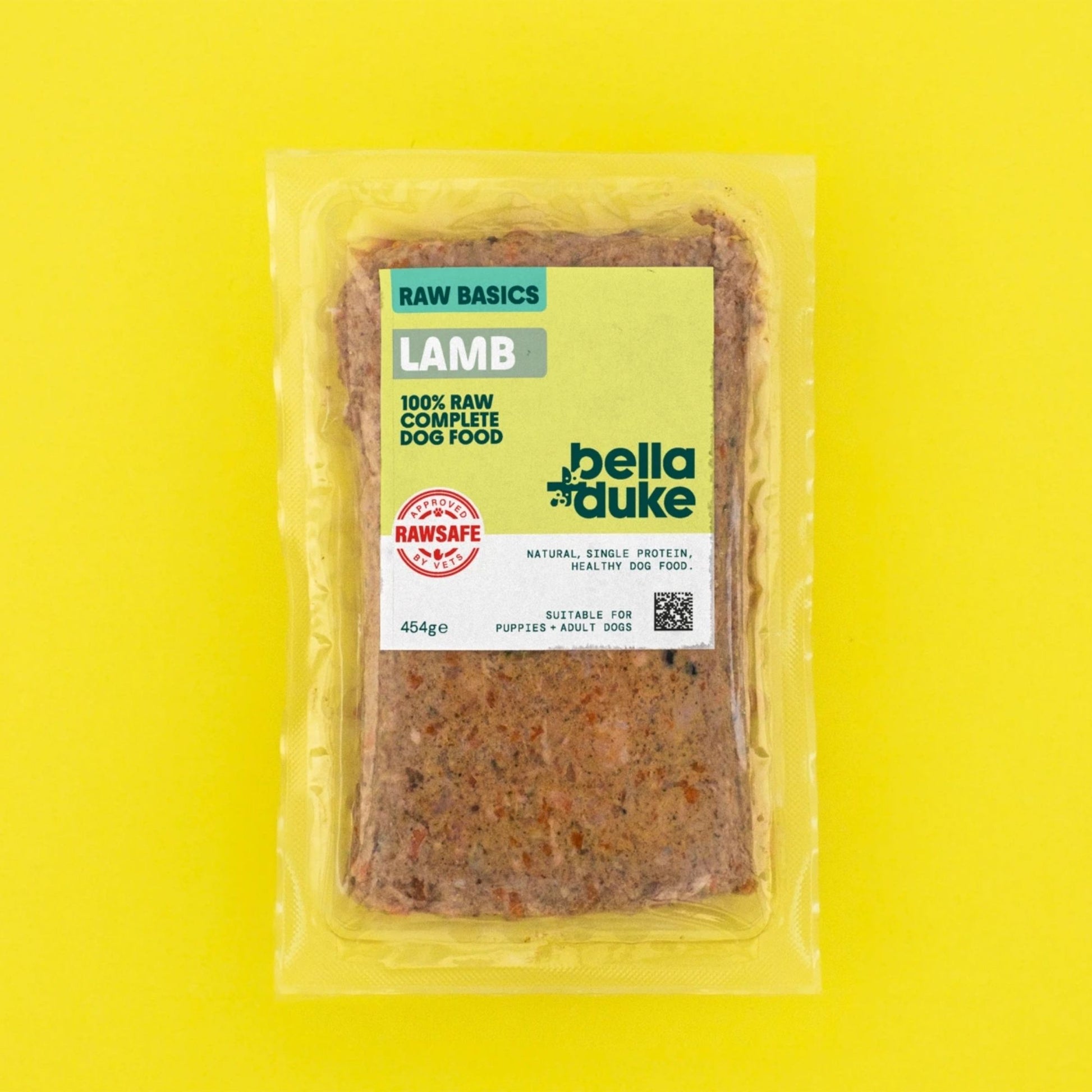 Packaged lamb dog food from Bella & Duke on a yellow background