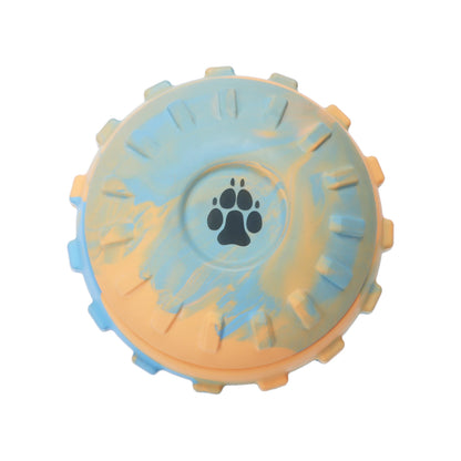 The reverse of the treat ball in blue and orange with paw print in the centre