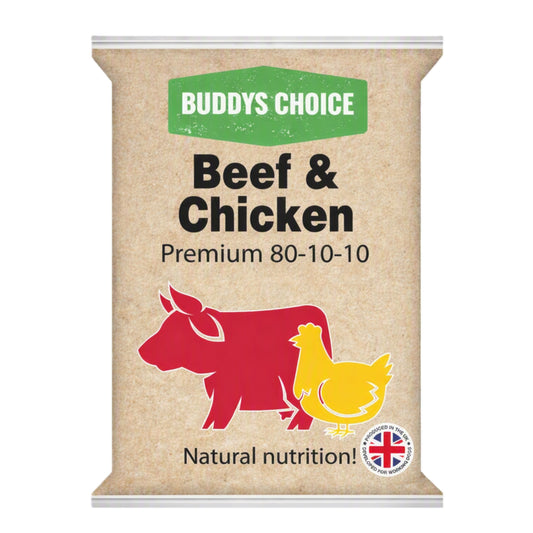 A packet of Buddys Choice Beef & Chicken Premium 80-10-10 natural nutrition dog food. The packaging is a kraft paper style with a green 'BUDDYS CHOICE' logo, black text, and illustrations of a red cow and a yellow chicken.