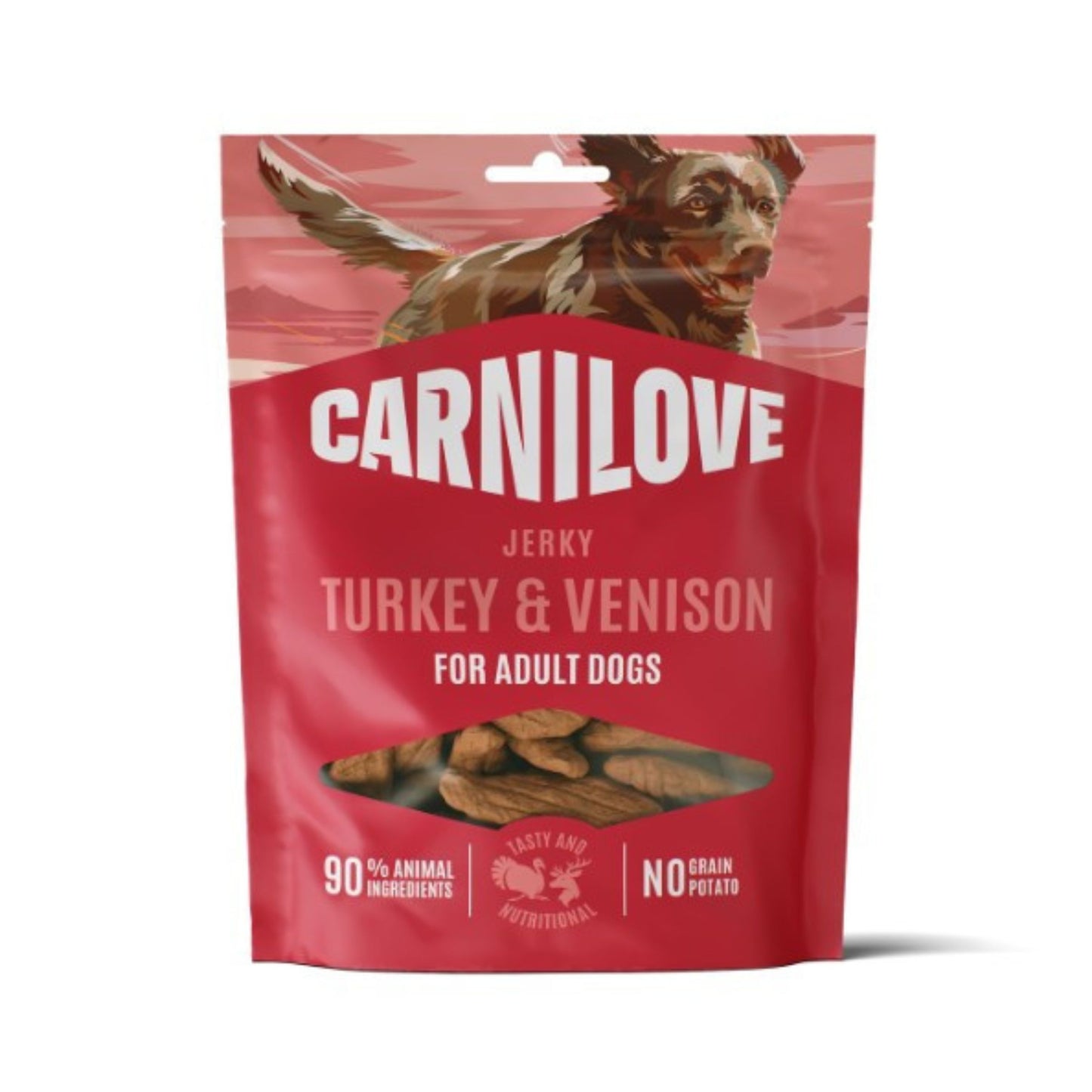 Carnilove Turkey & Venison Jerky dog treats in a red stand-up pouch with a dog illustration at the top and a clear window showing the treats inside.