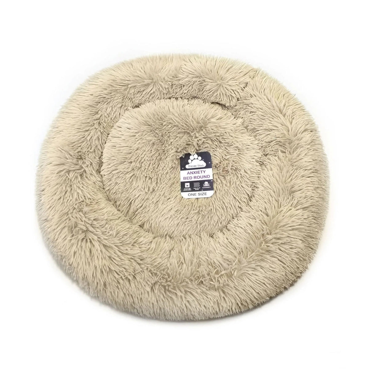 A round, plush faux fur pet bed in a light beige color, shown from a top-down view on a white background. A small black and white tag is visible in the center.