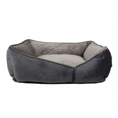 Gray pet bed with quilted texture on a white background