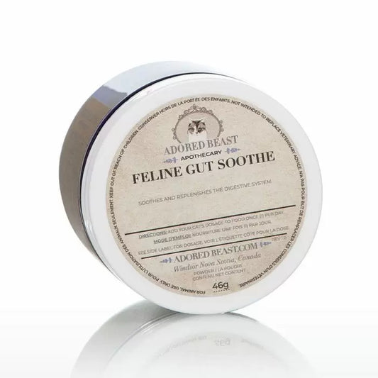 A container of Adored Beast FELINE Gut Soothe, a herbal dietary supplement for cats. The label on the container indicates the product name, weight (46g), and includes details about the product's benefits and ingredients.