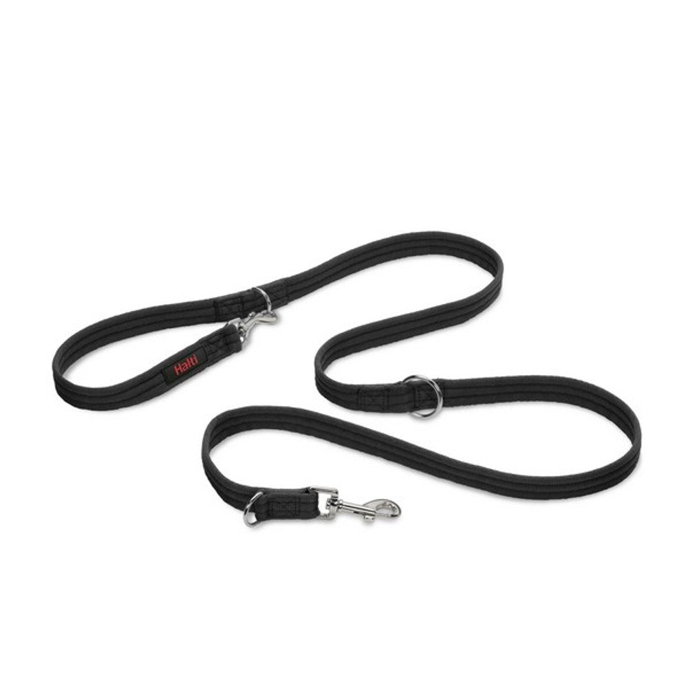 A multi-functional black dog training lead with adjustable sections and additional attachments.