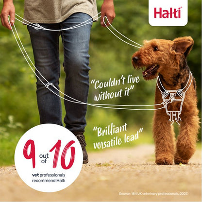 Dog wearing a Halti product with text and a person holding a leash, set against a natural background.
