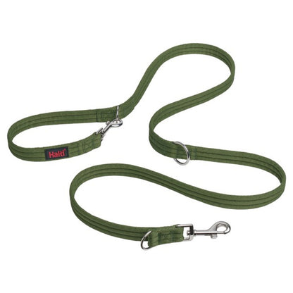 Green dog leash with metal clips on a white background