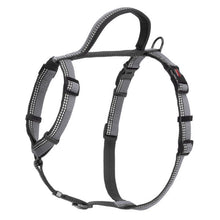 Gray dog harness with reflective stripes on a white background