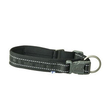 Black dog collar with reflective strip on a white background