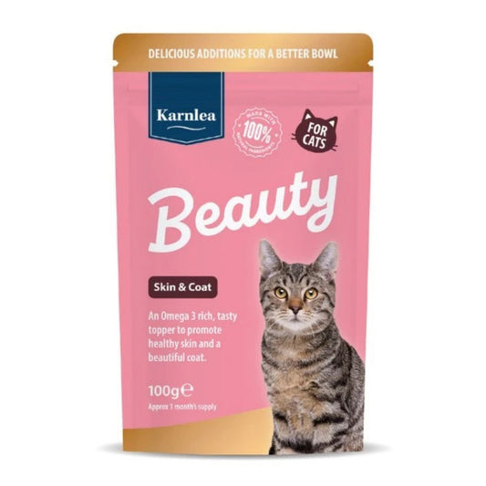 Pink packaging of 'Beauty' for cats with gold top on a white background