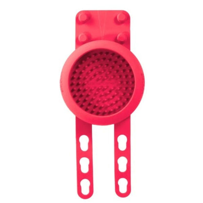 A bright pink lickimat attachment with two adjustable hook-style arms, shown on a plain white background.
