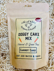 Life of Riley Doggy Carrot Cake Mix pack on a bed of straw
