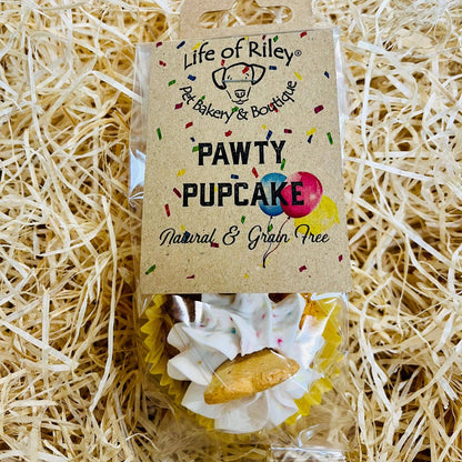 Puppy cupcake package with 'Life of Riley' branding on a straw background