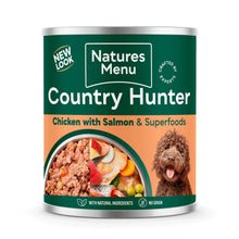 Can of Natures Menu Country Hunter dog food with a green label and image of a dog and food.