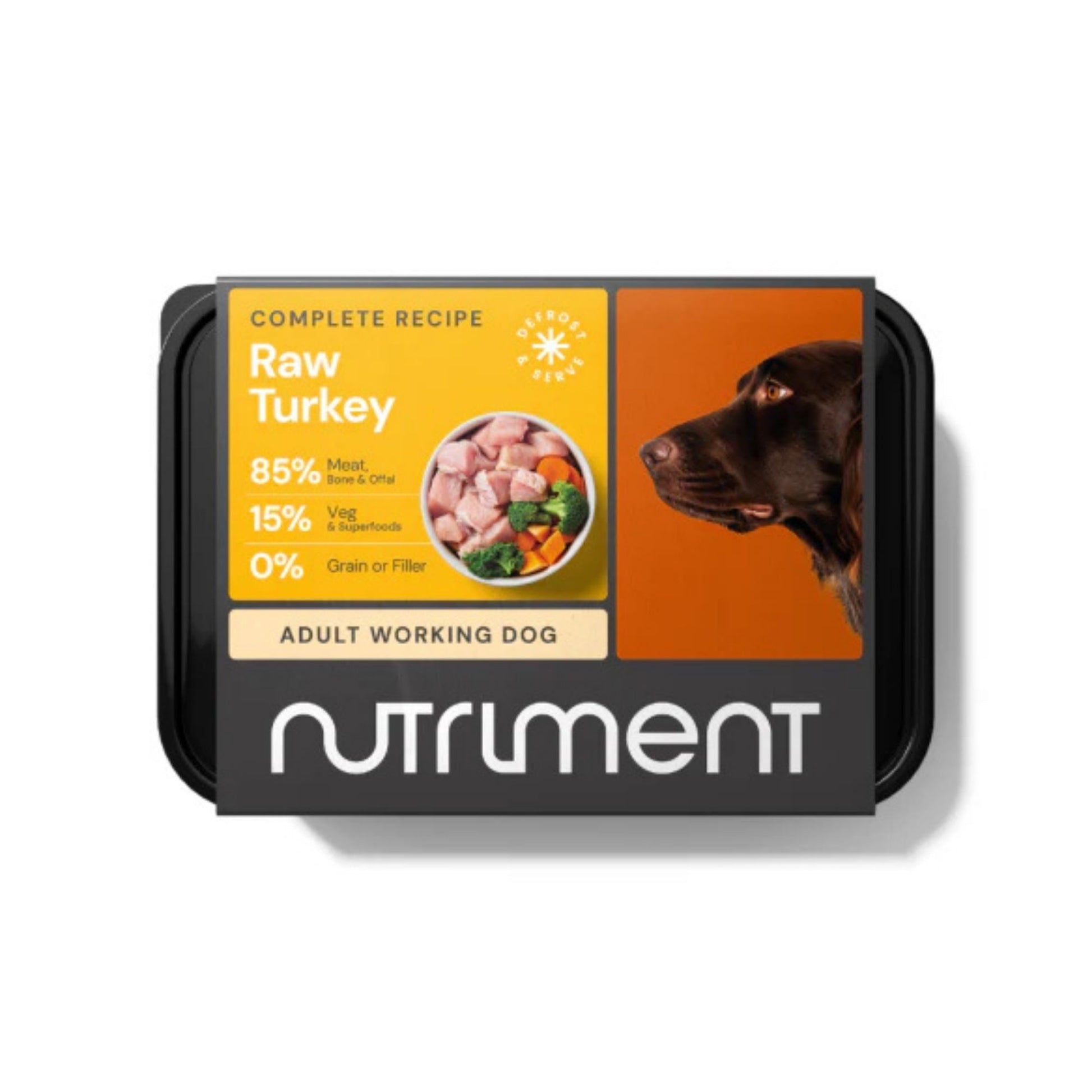 Dog food packaging with Nutriment branding and a picture of a dog on an orange background.