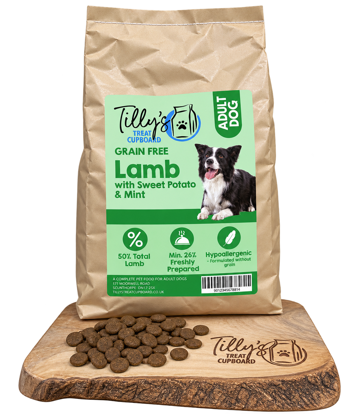 A bag of Tilly's Treat Cupboard Adult Dog Lamb with Sweet Potato & Mint dry dog food is displayed on a wooden cutting board with loose kibble pieces in front. The bag is kraft brown with a light green and white label featuring a black and white border collie.