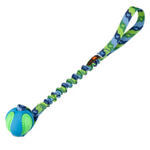 A dog ball toy with a built-in bungee tug. The toy has a green and blue color scheme with a patterned grip surface and a blue outer shell.