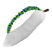A white sheepskin dog toy with a multicoloured bungee handle, designed for tug-of-war games.